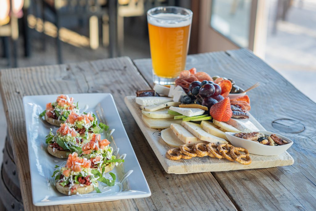 Charcuterie board, avocado toast, and beer from El Tapeo, Best Restaurants in Rocky Point, Live music and dancing in Puerto Penasco